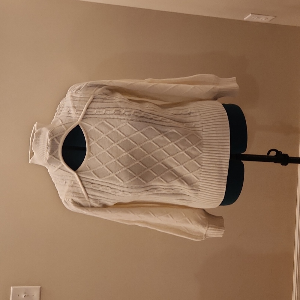 Creamy white sweater with peek-a-boo detail